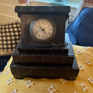 Unique stacked books with built in drawers and clock.